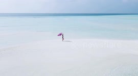 This drone shot was taken of myself walking along this stunning sand bank in the Maldives