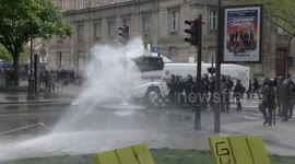 Water cannon used on protesters after violent scenes during Paris May Day rally