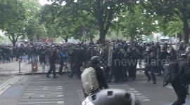 Police officer felled by debris from protesters in Paris May Day riots