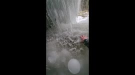 Canadian man ventures into frozen waterfall to retrieve perfectly-shaped ice balls