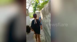 Abandoned baby rescued alive 'after being dumped in sack by depressed mum' at cemetery in the Philippines