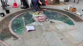 Chalk artist draws tribute to King Charles III on pavement in London