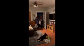 Parents lovingly surprise their daughters with an adorable puppy