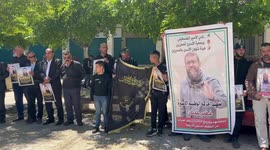 Palestinians take part in a protest following the announcement of the death of a Palestinian hunger striker Khader Adnan who was in Israeli Jails in the West Bank city of Bethlehem