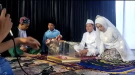 Oops! Witness falls backwards during wedding seating!