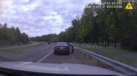 Patrol officer has lucky escape after BMW spins out of control on Virginia highway