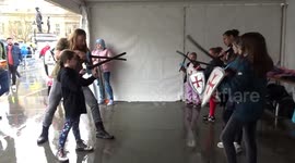 Girl knigts in the making fight at Knights Training School on St George's Day 2023 in Traflagar Square