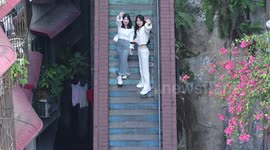 Rainbow Staircase Between Two Old Residential Buildings in Chongqing, China