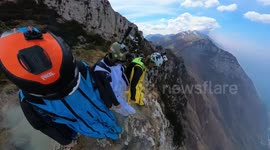 Watch this wingsuiter gracefully glide from mountaintop to beachfront in Italy