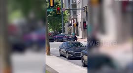 Atlanta shooting: Footage shows police cordon and heavily armed officers on scene