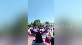 Panicked students gather outside school after 5.8 magnitude earthquake hits northern Philippines