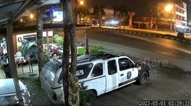 Container truck flips over when careless driver leans over to pick up his phone