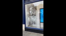 Coronation window display of King Charles in Windsor, UK