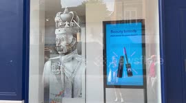 Coronation window display of King Charles in Windsor, UK