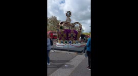 All hail the king: giant crown appears in Marble Arch as crowds gather for the coronation