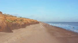 Drone shots of stunning East Yorkshire coastline where homes are threatened by erosion and Flamborough Head Lighthouse