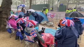 Heavy rain shower on The Mall on the eve of the coronation