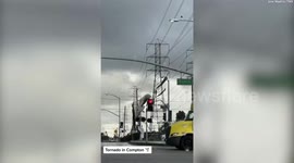 Tornadoes touch down in Los Angeles - damaging buildings, vehicles and trees