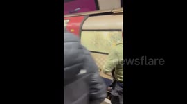 Terrifying scenes as passengers smash glass to escape train after 'fire' emergency on London Underground