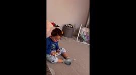 Boy being sneaky eating mummys food without knowing , and checking and getting tensed when i cough because he dont want me knowing what he is doing