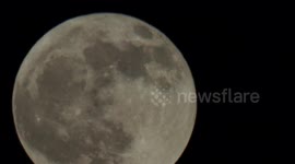 Full Flower Moon seen close-up in 4k above Kent, UK