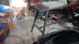 Massive king cobra looking for mate caught hiding under resident's dining table