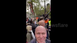 UK: Royal Fans Await Hours Long Outside Buckingham Palace Ahead Of King Charles III Coronation