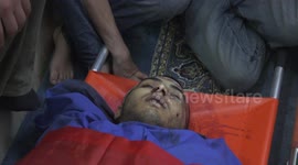 Palestinian gather during the funeral ceremony of the 22 year-old Palestinian Samir Shafii and Hamza Haryus, who died after a raid at the Nurshems refugee camp in Tulkarm, West Bank