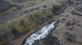 Soil salinity and salt level showing through earth from a drone perspective