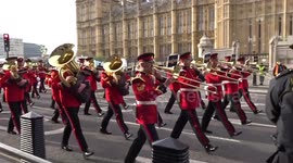 Coronation: Closeup view of the impressive military bands marching along Westminster Bridge