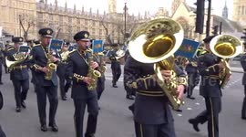 Military bands marching on Parliament Square on way to King Charles III coronation