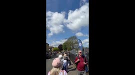 Police on horses and crowds gather in Windsor at The Coronation Big Lunch with opera singer performing on the Long Walk