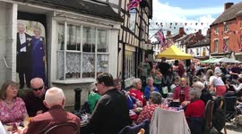 Royal celebrations were held in a market town today - as photos show pageantry there dating back a century