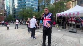 Singing in Aldgate sing a Robbie Williams classic