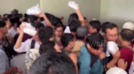 People Crowd For Food After Daily Friday Pray In Tangerang, Indonesia