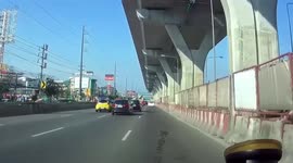 Flyover concrete section falls into oncoming cars on road below