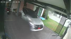 Garage roof collapses during powerful storm in Thailand