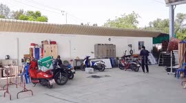 Ice cream woman finds baby crocodile hiding under her stall