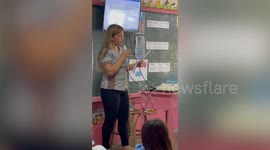 Hardworking teacher gives exams to pupils while treating asthma attack