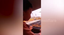 Toddler cries when wild monkey steals his toy