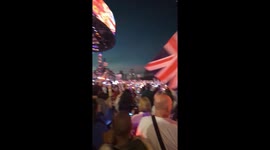 Crowd at the Coronation Concert sings God Save the King