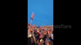 Crowd perspective as thousands sing 'God Save the King' at coronation concert