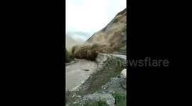 Massive landslide causes road blockage in southern China