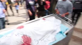 Citizens carry the bodies of Palestinians who were killed during Israeli warplanes airstrikes during their funeral in Gaza city