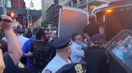 Demonstrator's face bloodied after clashes with police at Jordan Neely vigil in NYC