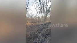 Dirt bike rider tries to jump creek before slamming into huge rock