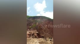 Mine landslide kills at least 130 workers as floods batter Congo