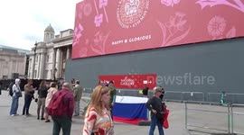 Russians mark V Day on 9 May in Trafalgar Square that is still decorated for the Kings coronation