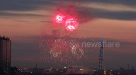 Victory Day's fireworks coloured skyline of St Petersburg, Russia