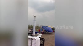 Storm batters market uprooting stalls in northern Thailand